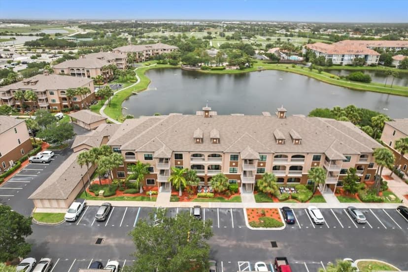 Maintenance-Free Waterfront Living in the Heart of Viera! Rare opportunity to own a first-floor, waterfront condo in the highly desirable, gated community of Three Fountains of Viera