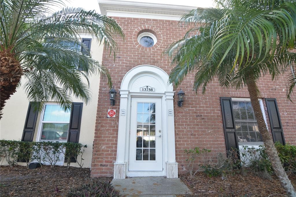 Welcome to Whispering Oaks a serene gated, waterfront community where tranquility meets convenience