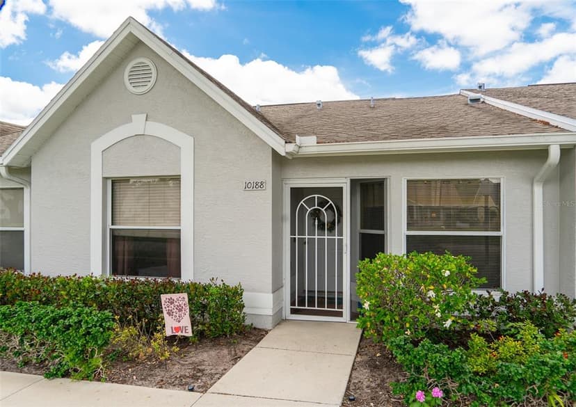 Welcome to 10188 Regent Circle Unit 2802, a beautifully maintained 2-bedroom, 2-bathroom villa nestled in the highly desirable Regent Park community of North Naples