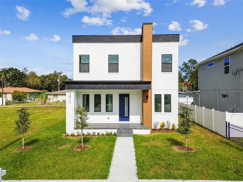 Welcome to this sleek and stylish contemporary 4-bedroom, 3-full bathroom home in the heart of a vibrant neighborhood! The moment you step inside, you’ll immediately feel the attention to detail; 9’ ceilings, a modern interior paint scheme, and cement-look tile flooring that spans the entire first floor